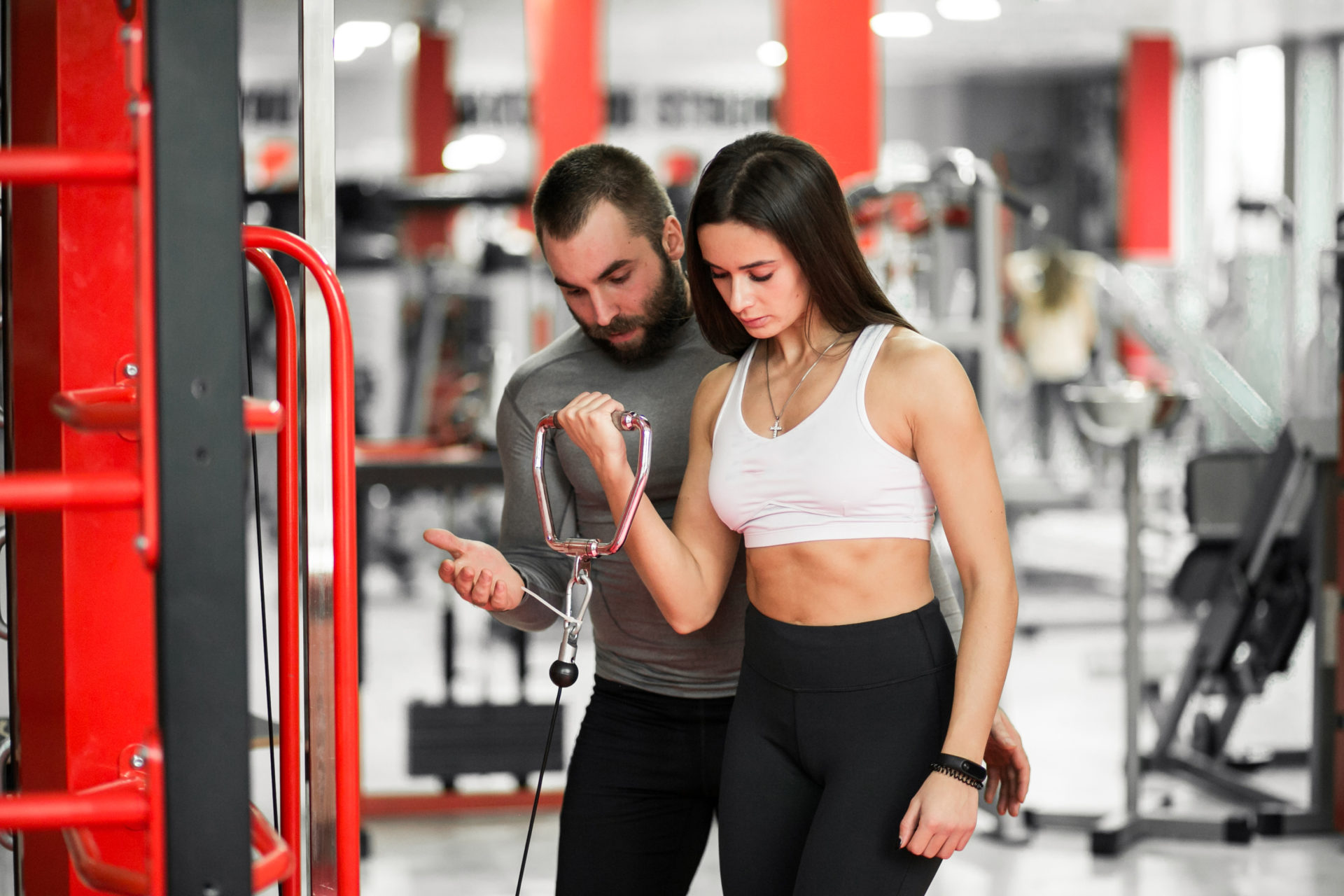 Couple at gym exercising