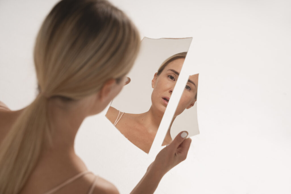 Woman suffering from body dysmorphia