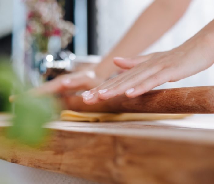 Close up on Pasta Straps in Woman's Hands