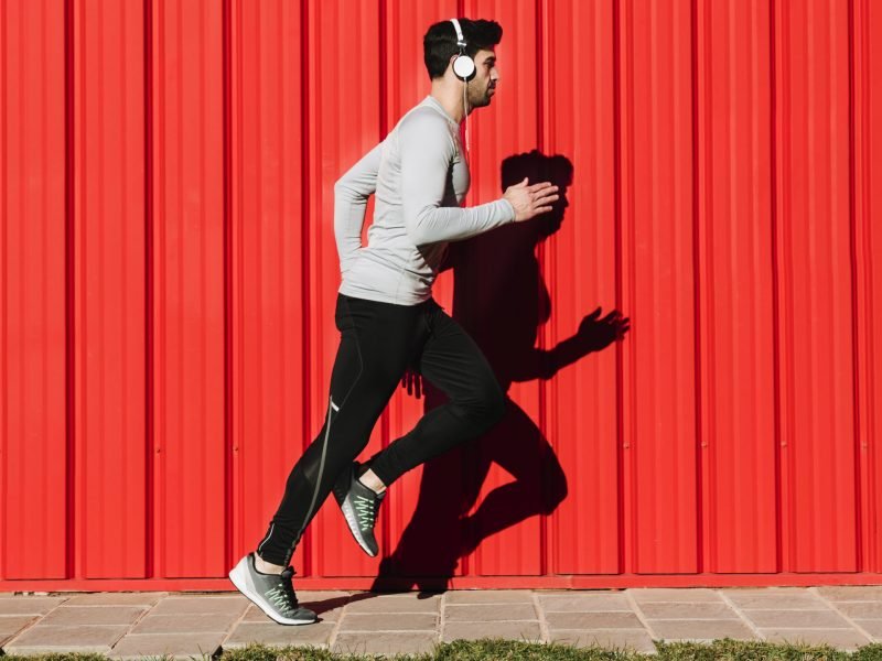 Man listening to music and running