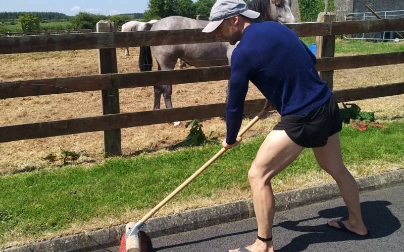 Manuel sweeping the tarmac